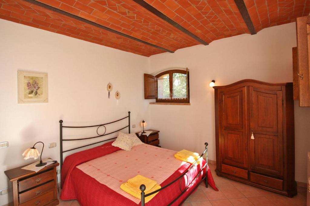 Postel nebo postele na pokoji v ubytování Pienza by PosarelliVillas