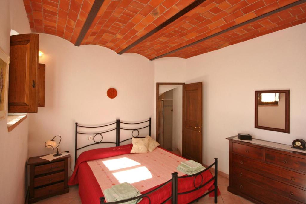 Postel nebo postele na pokoji v ubytování Pienza by PosarelliVillas