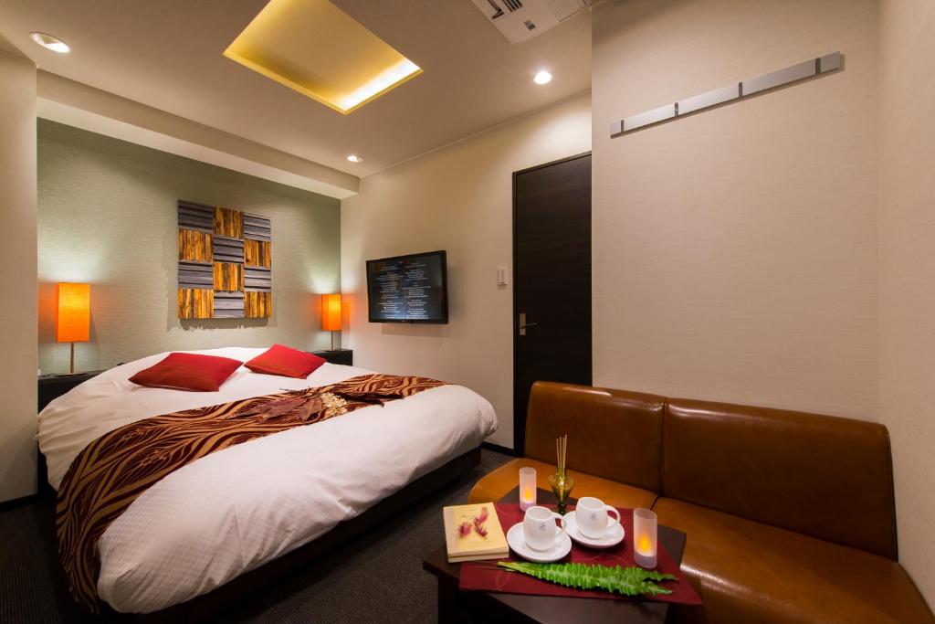 Postel nebo postele na pokoji v ubytování Hotel COREST (Adult Only)