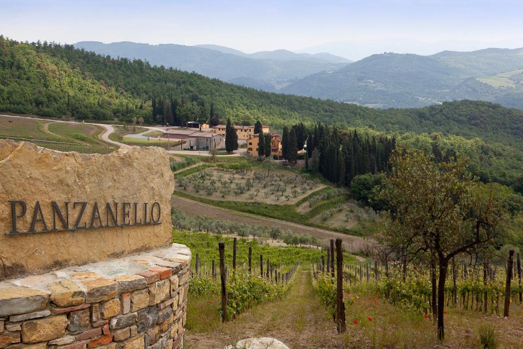 a sign that reads pampanico on a stone wall at Agriturismo Panzanello in Panzano