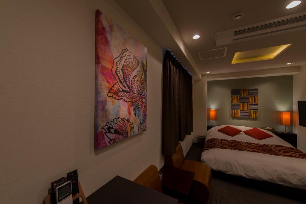 Postel nebo postele na pokoji v ubytování Hotel COREST (Adult Only)