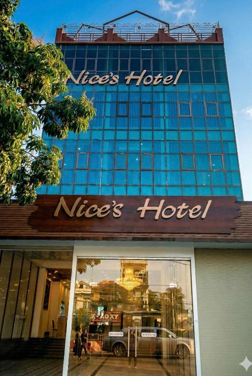 a niegros hotel sign in front of a building at Nice's Hotel Ninh Binh in Ða Gia