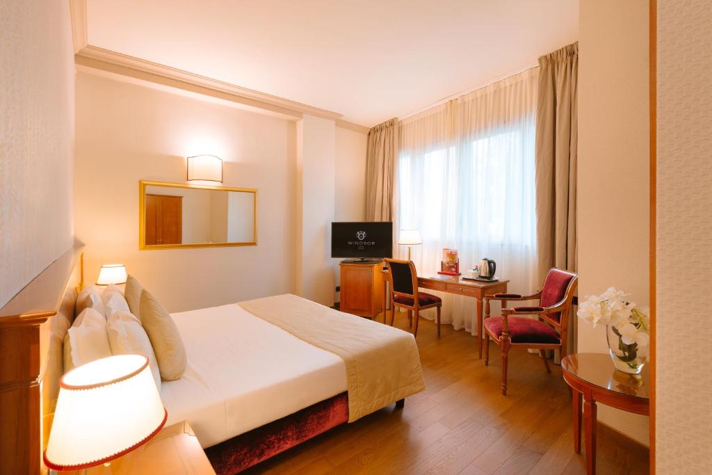 TV a/nebo společenská místnost v ubytování Windsor Hotel Milano