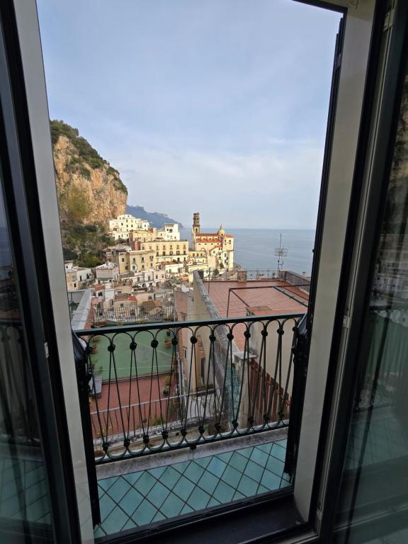 a view of a city from a window at Dany House in Atrani
