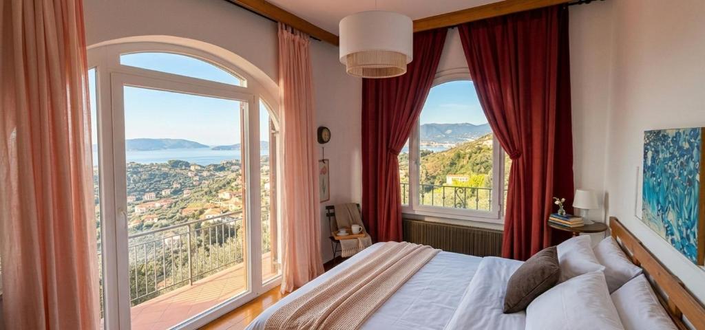 a bedroom with a bed and a large window at Ai Canarbin - colline di Lerici in Lerici