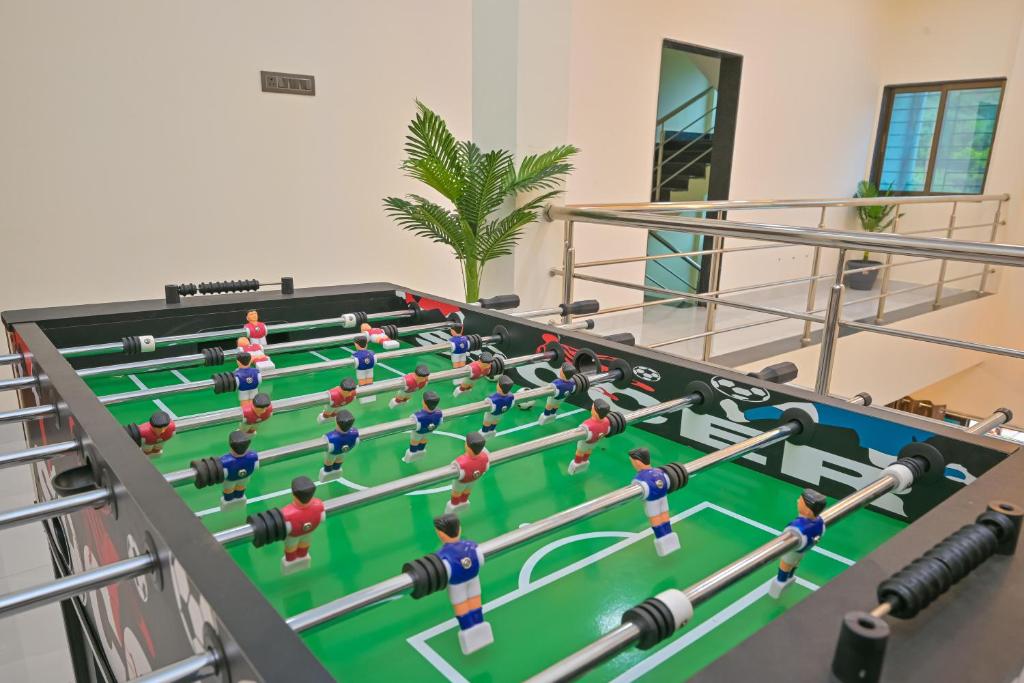a group of people playing a game of snooker at 5BHK SSV Villa in Lonavala