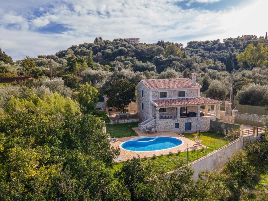 an aerial view of a house with a swimming pool at Villa Irida by Elayan Villas Corfu in Sidari