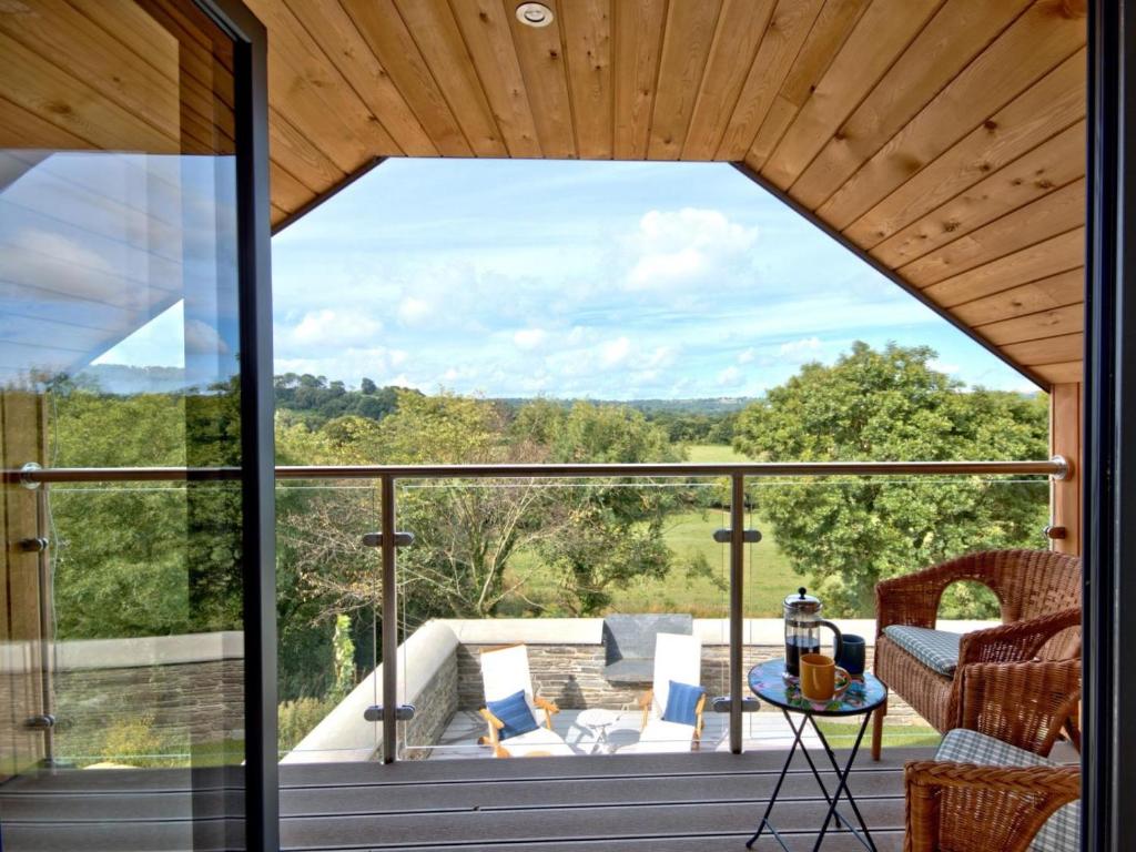 a view from the deck of a house with a large window at 2 Bed in Cardigan oc-83919 in Cilgerran