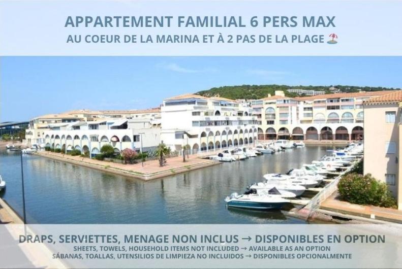 an advertisement for a marina with boats in the water at Le cabanon de Mirza in Sète