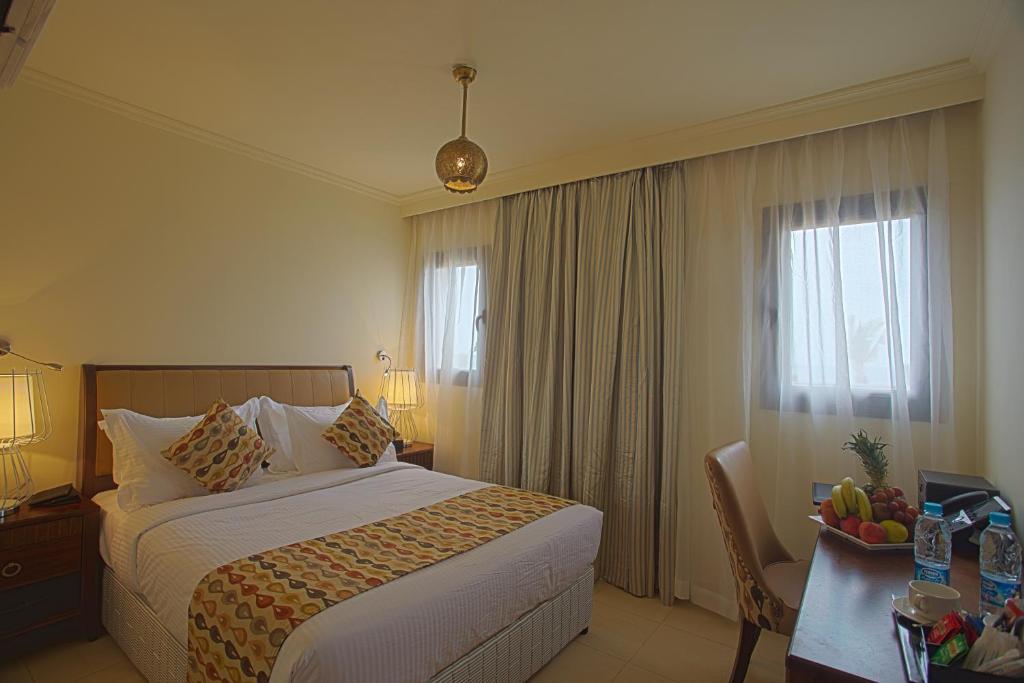 Postel nebo postele na pokoji v ubytování Royal L'azure Resort