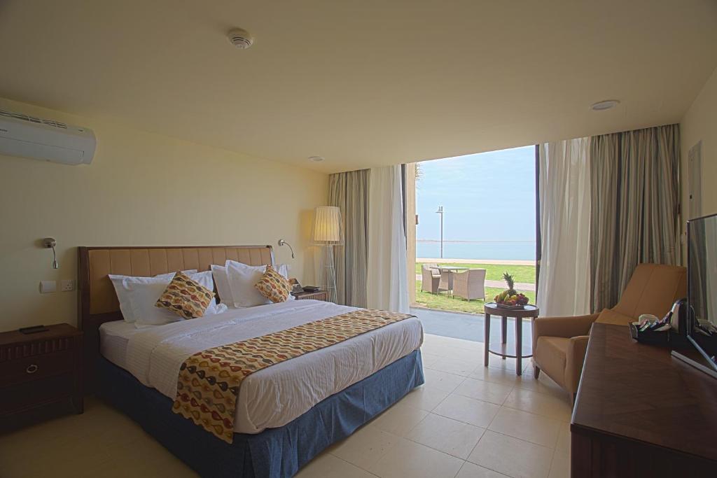 Postel nebo postele na pokoji v ubytování Royal L'azure Resort