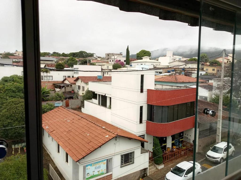 a view from a window of a city at Hotel Olympia in Cláudio