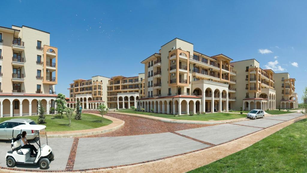 a rendering of an apartment complex with a scooter at Ines - Golf und Meer Bulgarien in Balchik