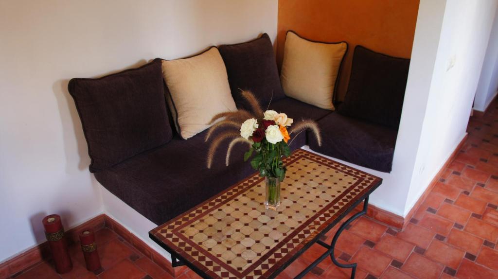 Area soggiorno di Riad Jardin des Orangers