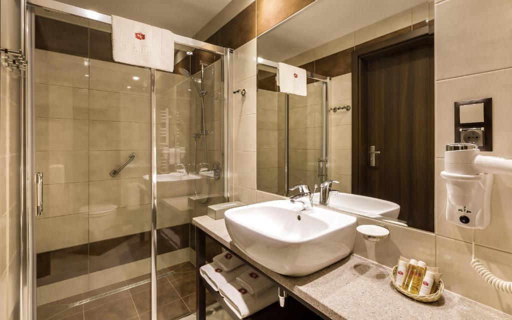 Kúpeľňa v ubytovaní Hotel Kryształ Conference & Spa