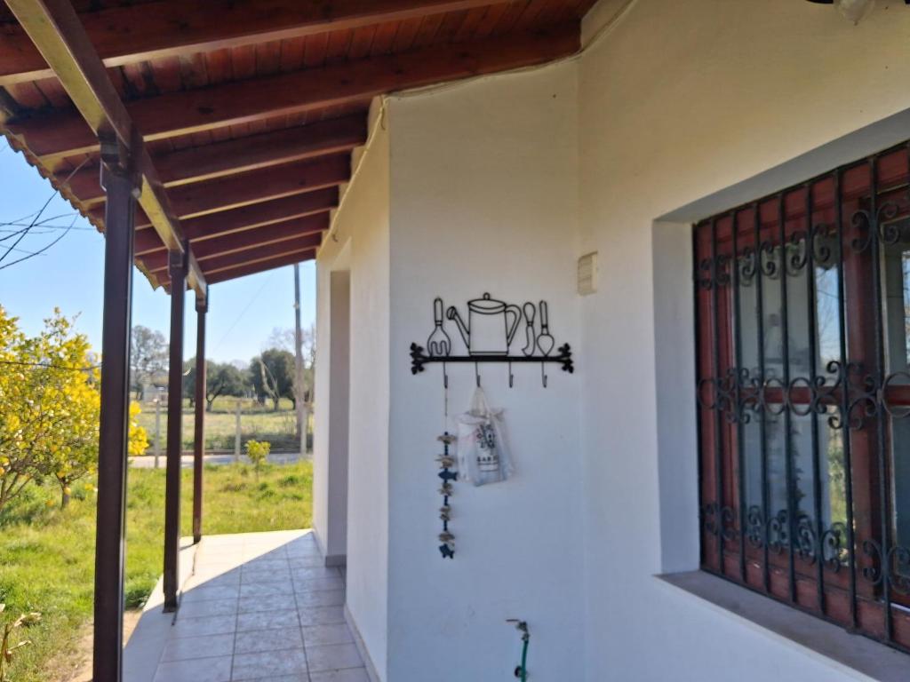 a porch of a house with wrought iron gates at tragano in Traganón