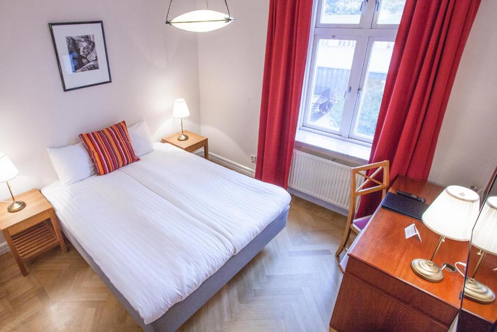 Postel nebo postele na pokoji v ubytování Hotel Bishops Arms Lund