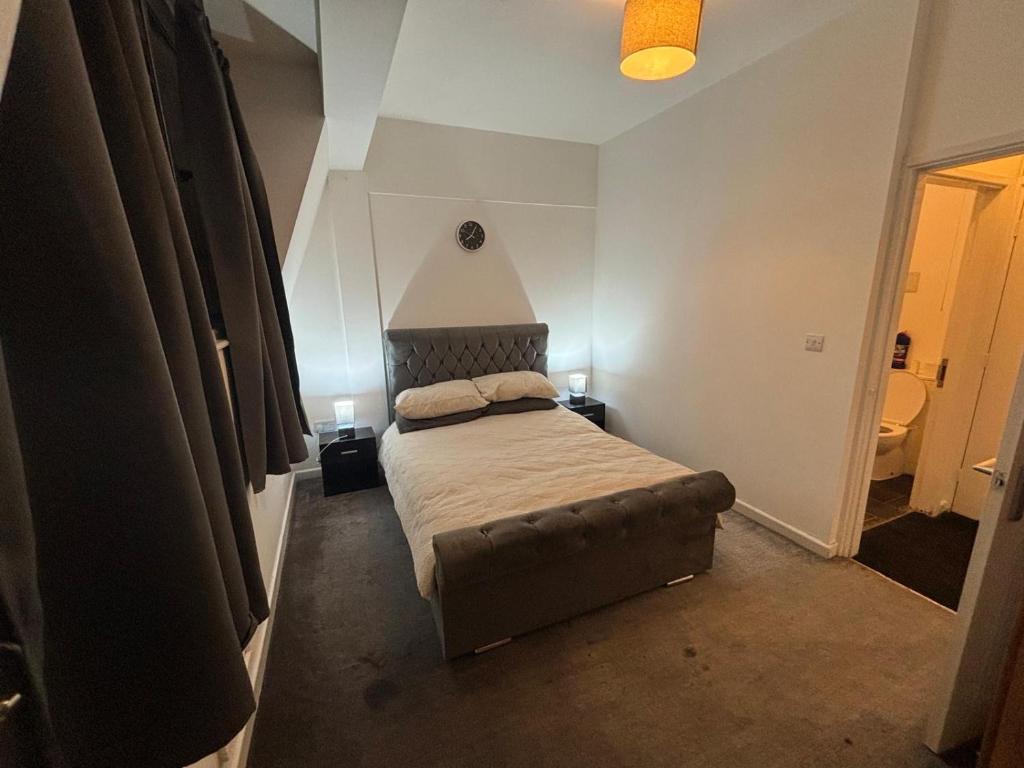 a small bedroom with a bed in a room at One Bedroom flat in Doncaster Prime Location in Doncaster