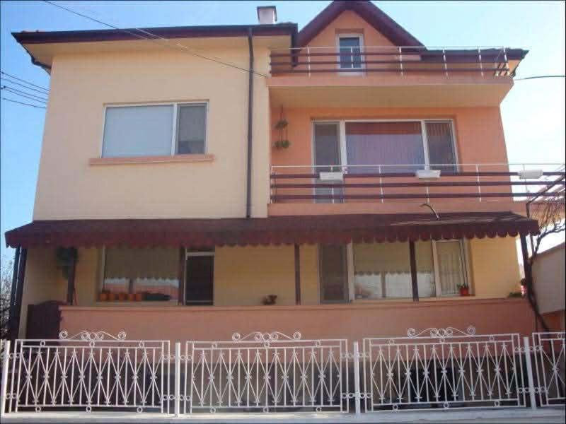 a large house with a fence in front of it at DekaHome4you in Marten
