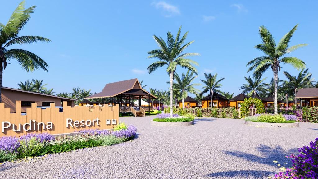 a resort entrance with purple flowers and palm trees at Pudina Resort in Semporna