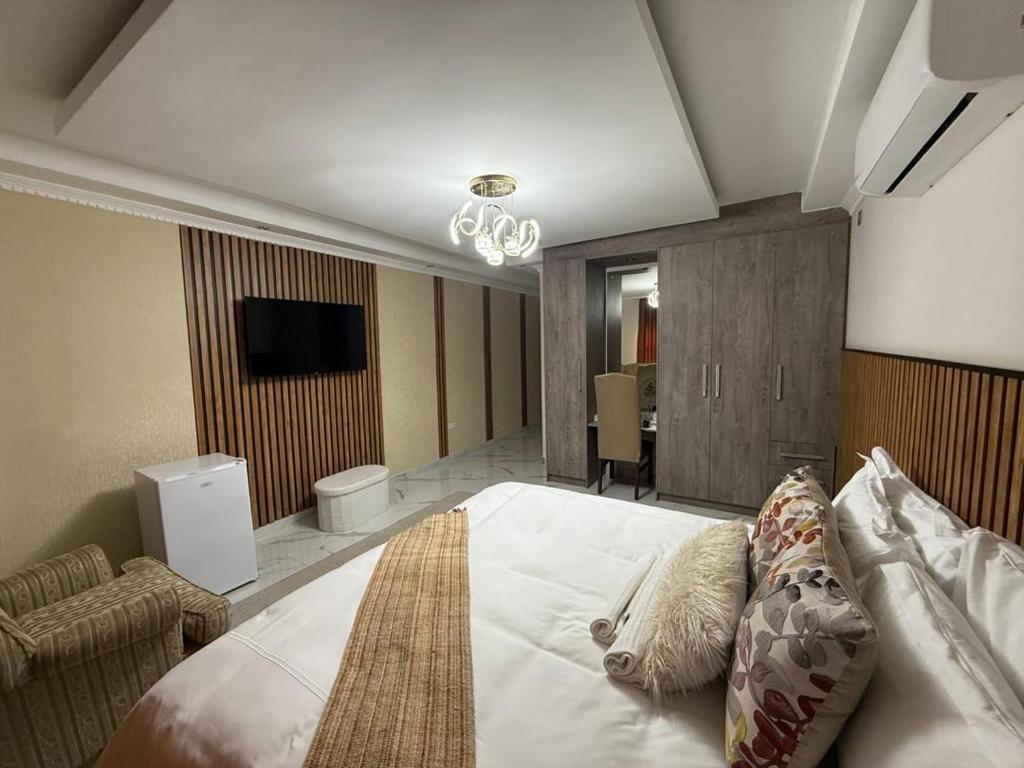 Ένα ή περισσότερα κρεβάτια σε δωμάτιο στο Rosenia Manor B&B