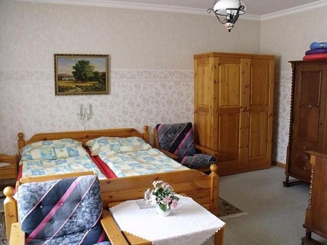 Postel nebo postele na pokoji v ubytování Magdi Panzió