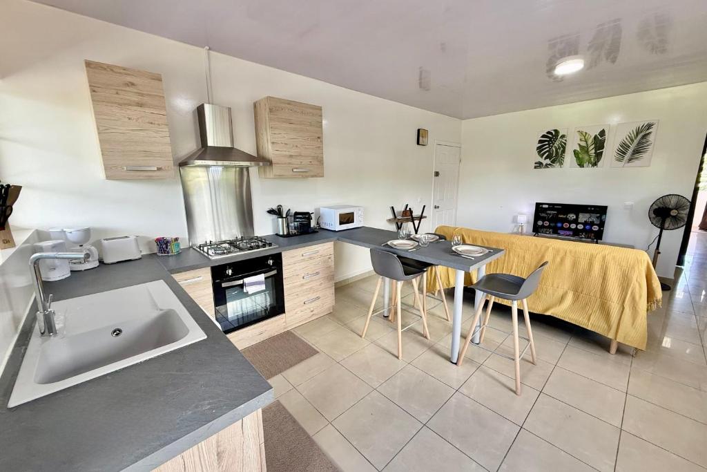 Appartement Manohiti le calme au centre de Pirae - 1 ch clim WiFi - hébergement à Tahiti