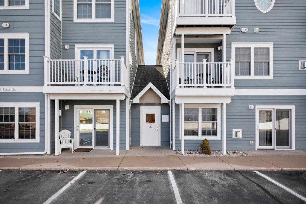 a parking lot in front of a building at Bay Park 32: Downtown Condo! in Traverse City