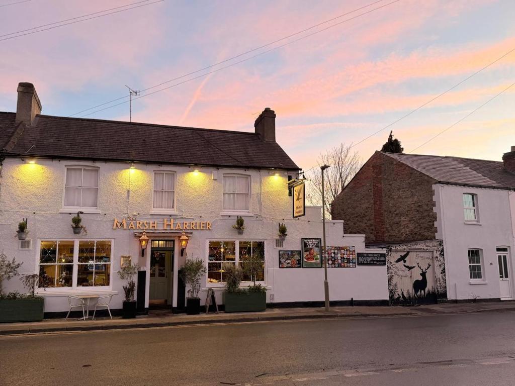 a white building on the side of a street at The Marsh Harrier B&B in Oxford