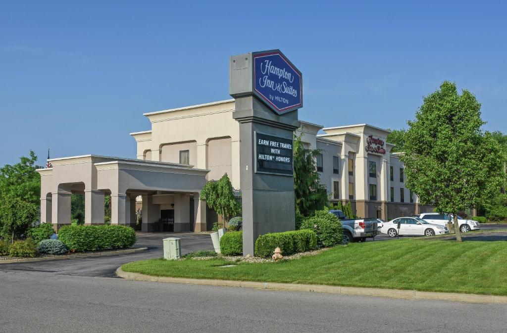 a building with a sign in front of it at Hampton Inn & Suites Youngstown-Canfield in Canfield