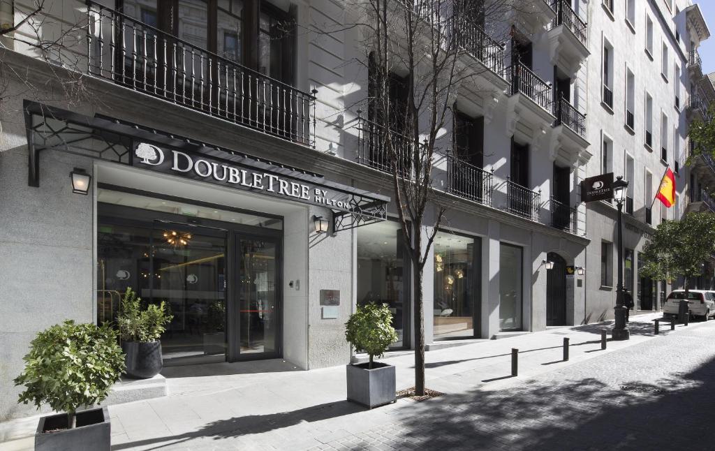 a dolittle tree shop on a city street at DoubleTree by Hilton Madrid-Prado in Madrid