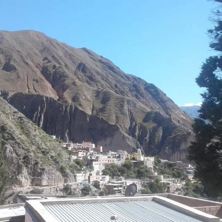 a town on a hill with a mountain at Alojamiento Lidia in Iruya