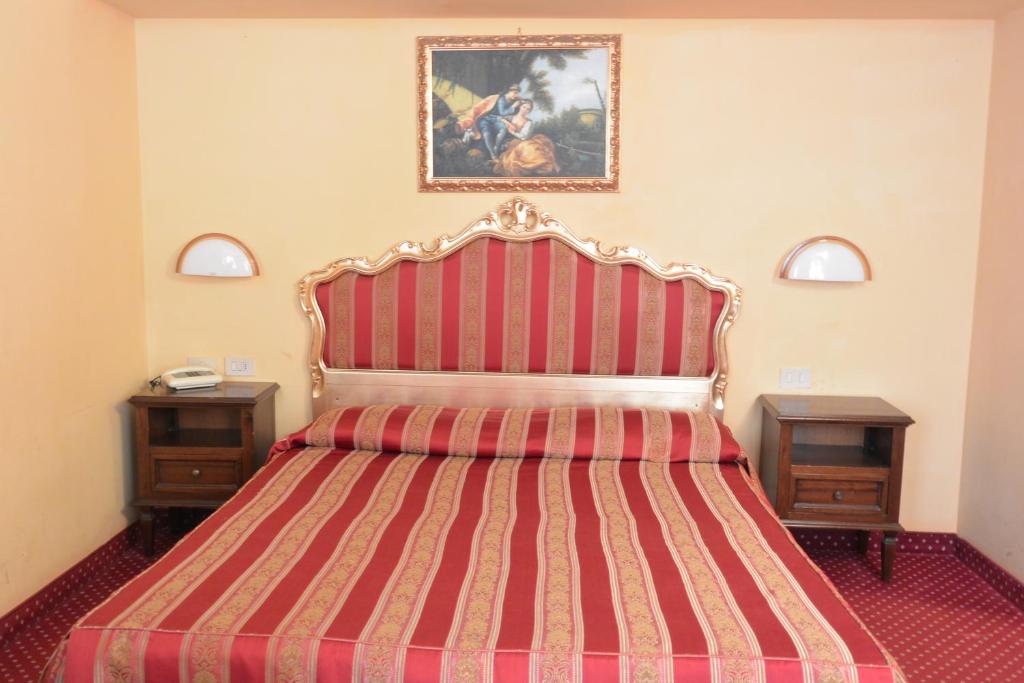 Postel nebo postele na pokoji v ubytování Hotel Città Di Milano