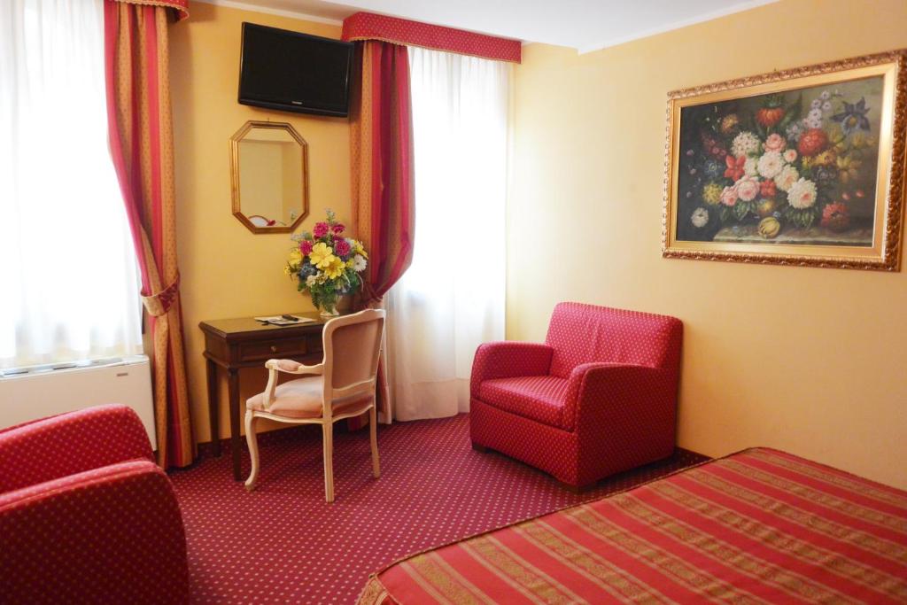 TV a/nebo společenská místnost v ubytování Hotel Città Di Milano
