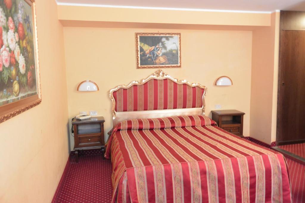 Postel nebo postele na pokoji v ubytování Hotel Città Di Milano
