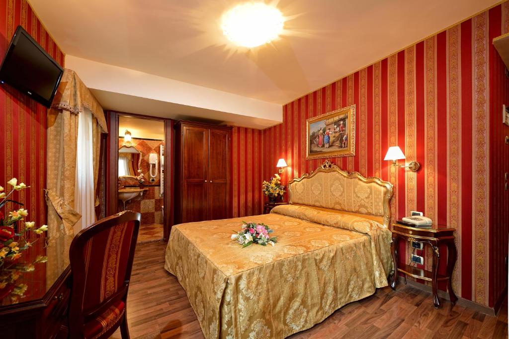 Postel nebo postele na pokoji v ubytování Hotel Città Di Milano