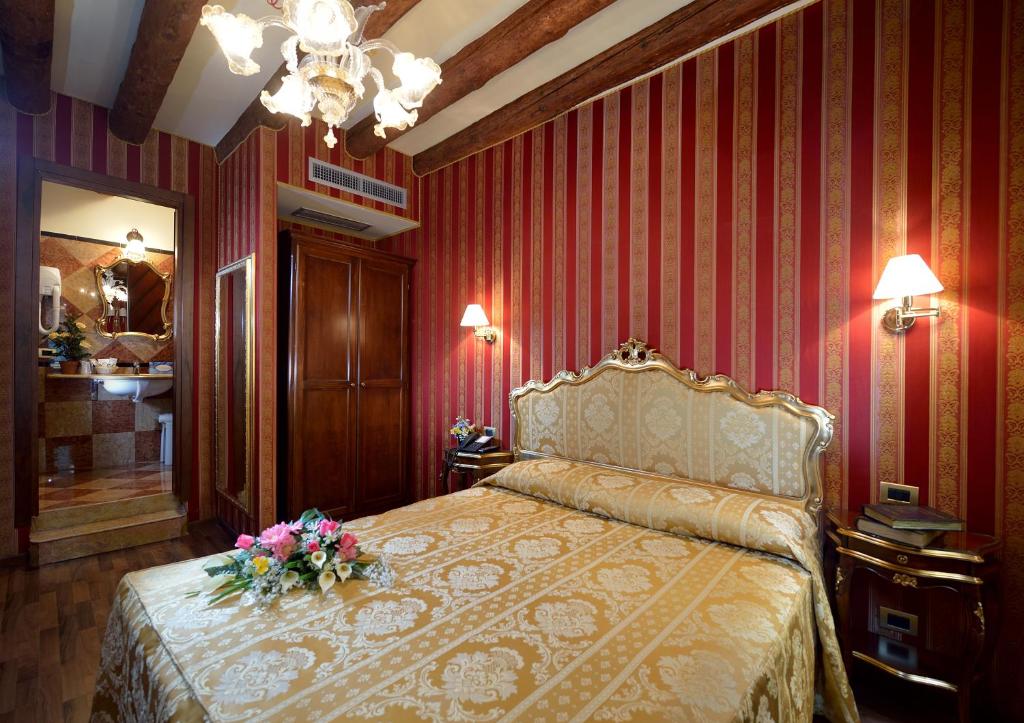 Postel nebo postele na pokoji v ubytování Hotel Città Di Milano