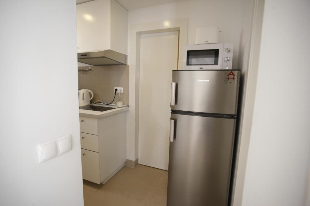 Kuchyň nebo kuchyňský kout v ubytování Top Alfama Appartment