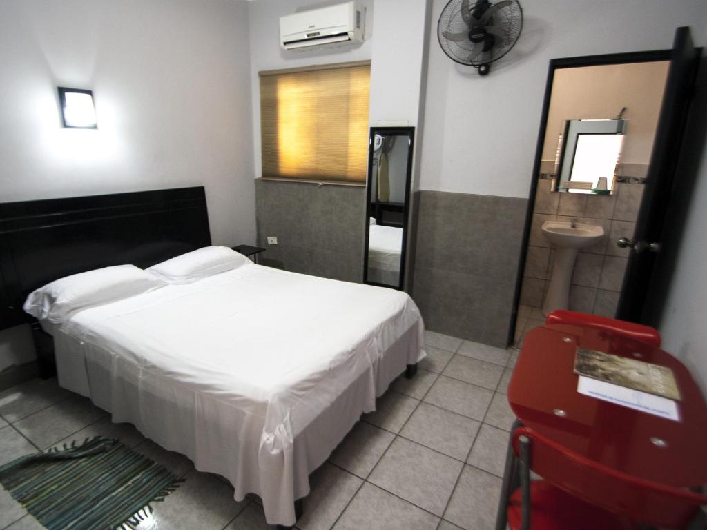 Postel nebo postele na pokoji v ubytování Jer`s Hostal