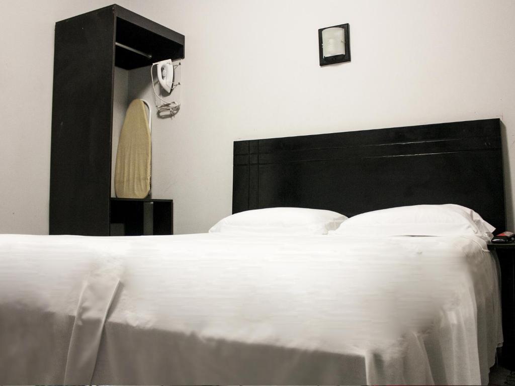 Postel nebo postele na pokoji v ubytování Jer`s Hostal