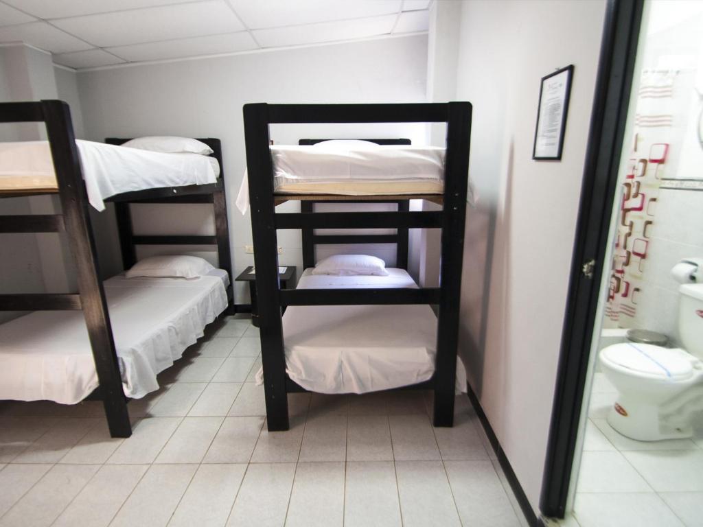 Postel nebo postele na pokoji v ubytování Jer`s Hostal