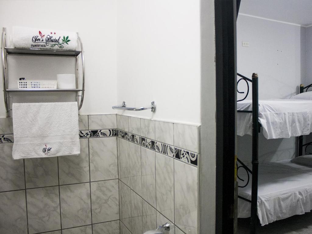 Postel nebo postele na pokoji v ubytování Jer`s Hostal