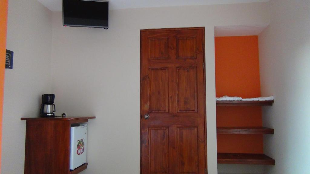 TV a/nebo společenská místnost v ubytování Mountain Faro Hotel