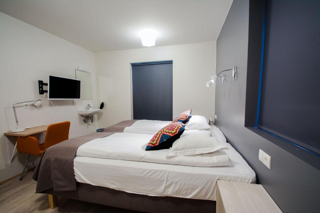 Voodi või voodid majutusasutuse Brekkugerdi Guesthouse toas