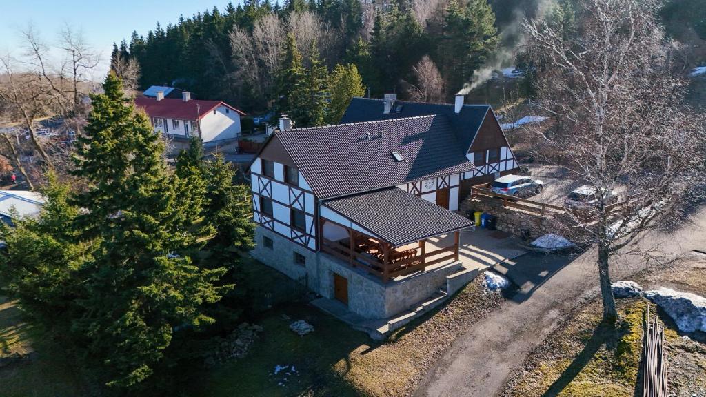 an overhead view of a house with a roof at Penzion Gerhard Klíny in Klíny