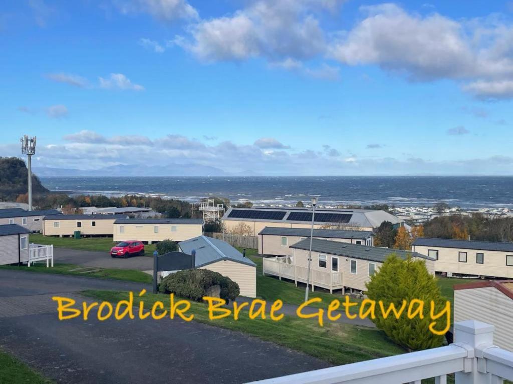 a view from a balcony of a large building at Brodick Brae Getaway in Dunure