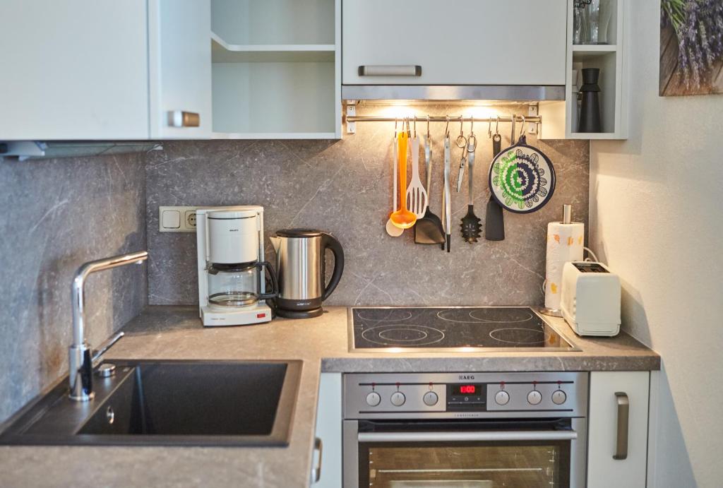 Kuchyňa alebo kuchynka v ubytovaní Appartement Relax & Sport