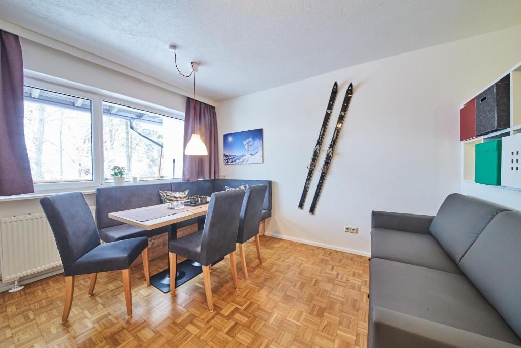 Televízia a/alebo spoločenská miestnosť v ubytovaní Appartement Relax & Sport