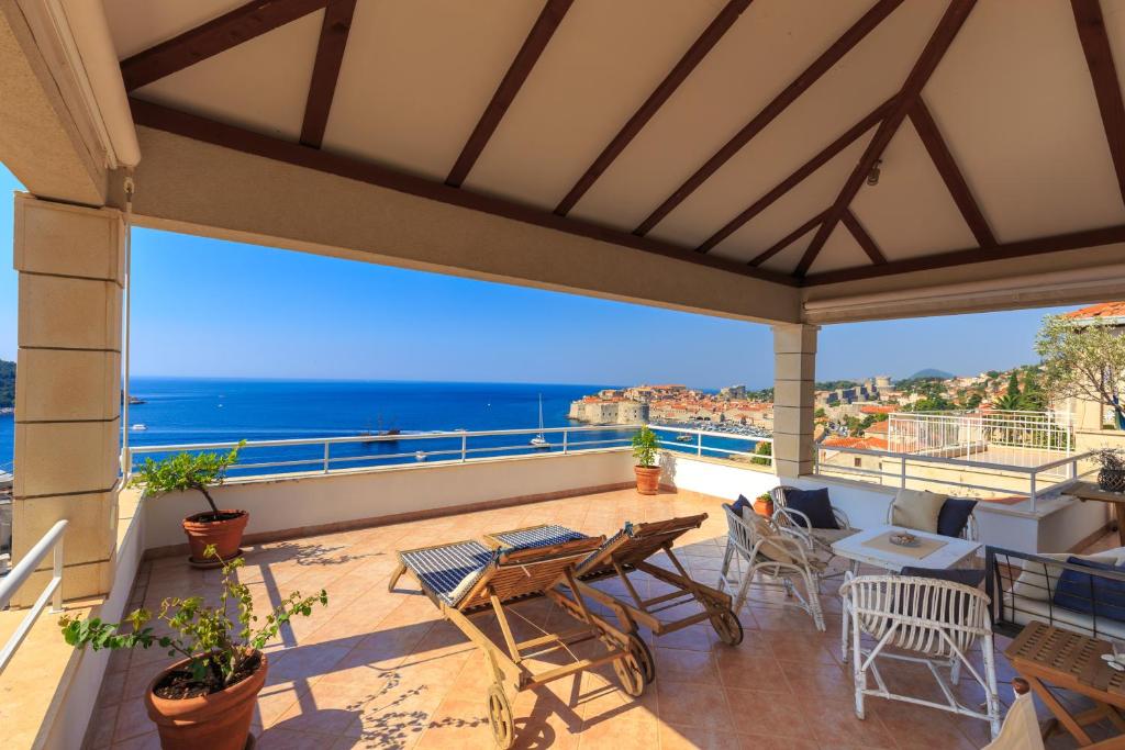 a balcony with a view of the ocean at Apartment Hedera A14 in Dubrovnik