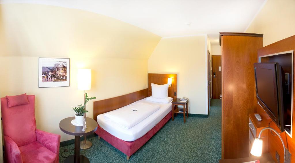 Postel nebo postele na pokoji v ubytování Hotel Weisses Lamm
